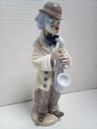 Lladro #5471 Sad Clown Saxophone Player 9 Inch  Statue Has Lovely Design In Soft Colors RS/A2