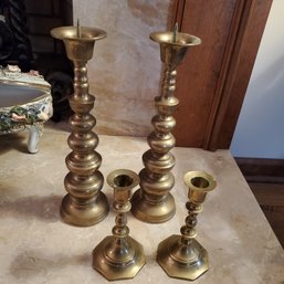 Four Vintage Brass Candlestick Holders