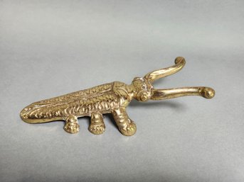 A Vintage Brass Cricket Shoe Horn, Made In Japan