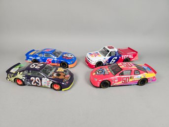 Four Metal NASCAR Cars