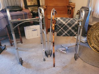 Pair Of Walkers , Heating Pad ,and Two Canes. Br1