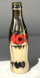 175. Coca Cola Centennial Celebration Gold Bottle