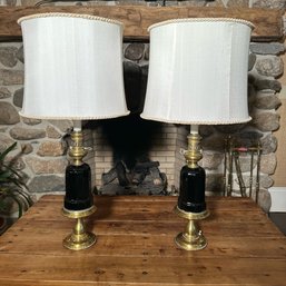 A Pair Of Brass And Black Converted Antique Oil Lamps -