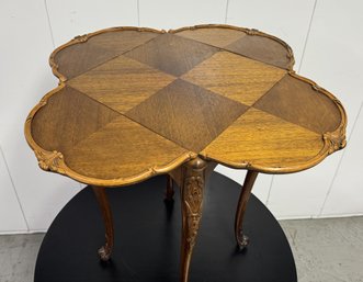 An Antique Carved Drop Leaves Side Table