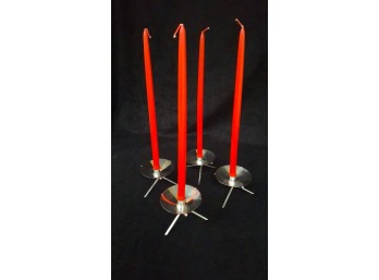 MCM 1960'S DANISH TRIPOD BASE SILVER PLATE CANDLESTICKS WITH CANDLES SET OF 4