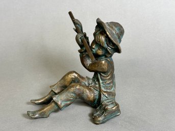 A Brass Figurine Of Boy Playing Flute With Amazing Patina