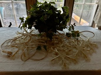 String Of Star Lights With Faux Ivy Basket