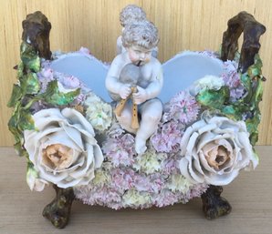 Two Handle Cherub & Flowered Footed Bowl, Playing Trumpets