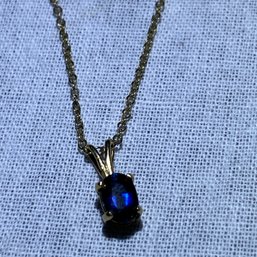 Diminutive Marked 14kt Gold Necklace And Sapphire Pendant Total Weight 1.5g