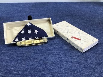 Folded Flag With Pocket Knife