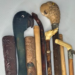 Collection Of Wood Pieces And Canes With Bird Carvings