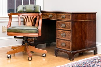 Leather Tooled Desk Along With A Leather Upholstered Desk Chair