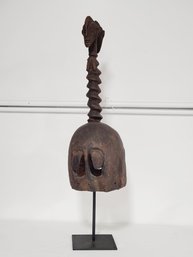 Antique Carved African Tribal Helmet On Black Metal Stand