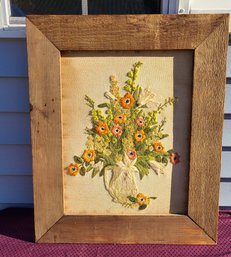 Needlework In A Rustic Frame