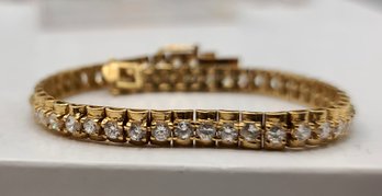 Gold Plated (Stamped .925) Tennis Bracelet With CZ Stones And Double Safety Clasp - Very Nice!!