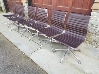 Set Of Six Brown Faux Leather Covered Eames Type Aluminum Group Low Back Swivel Chairs