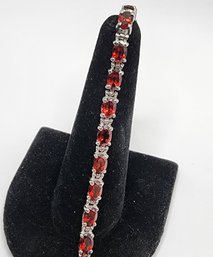 Red Garnet Tennis Bracelet In Stainless