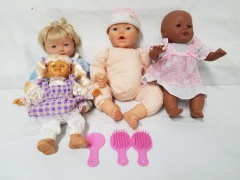 Four Baby Dolls With Clothes & Accessories