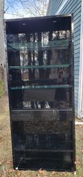 Sleek Black Laquered Book Case With Glass Shelves, Lighting  And Drawer