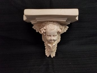 Cupid Shelf Sconce