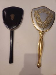 Two Vintage Hand Mirrors - One Black Enamel The Other Silver And Gold Plate