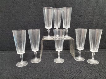 Eight Vintage Cut Crystal Champagne Glasses