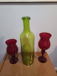 Two Vintage Red Glass Candle Holders With Large Olive Green Glass Bottle