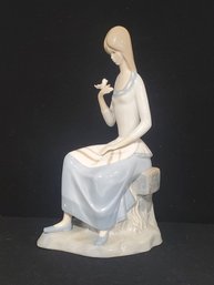 Villamarchante Valencia Spain Porcelain Girl Sitting With Bird In Her Hand