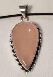 Silver Plated Teardrop Rose Quartz Pendant 1 3/8' X 3/4' With A 16-18' Cloth Necklace