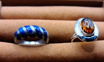Two Sterling Silver Rings, One With Lapis And The Other Amber