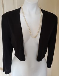 Neiman Marcus Black Cashmere 3/4 Sleeve Sweater Paired With Strand Of Vintage Pearls