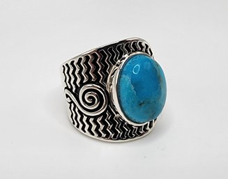 Oval Turquoise Spiral Design Ring In Rhodium Over Sterling