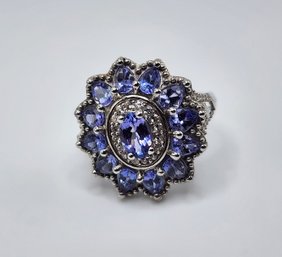 Beautiful Tanzanite & White Zircon Floral Ring In Platinum Over Sterling