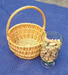 Green Bubble Glass Vessel Full Of Wine Corks And A Pretty Basket