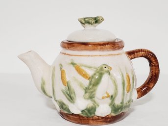 Crackle Finish Embossed Bird Motif Pottery Teapot
