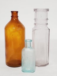 Trio Of Antique Apothecary Bottles - Amber, Clear & Aqua