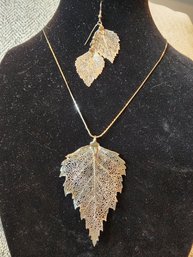 Silver Toned Leaf Necklace And Earrings
