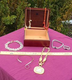 A Wooden Box With A Fun Collection Of Costume Jewelry