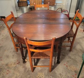 Antique Dining Room Table Over 100 Years Old.  Also, The 4 Rush Chairs.