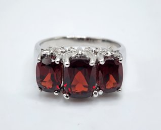 Red Garnet 3 Stone Ring In Rhodium Over Sterling