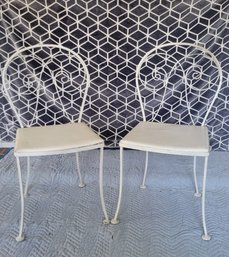 MCM (Mid Century Modern) Wrought Iron Chairs With White Pleather Seats .    - - - - - - - - - - Loc: Garage