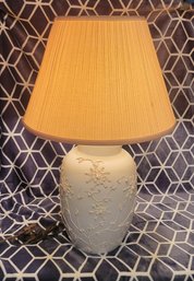 Tall Ceramic Lamp With Raised Floral Detail.