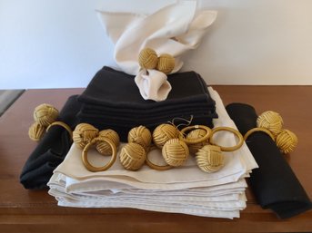 Two Sets Of Napkins And Napkin Holders