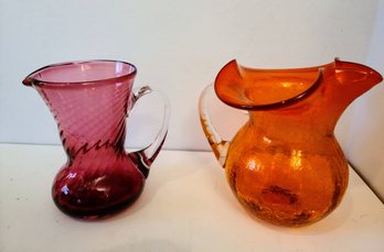 Vintage Crackled Orange Colored Glass Pitcher And Cranberry With Clear Handle