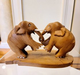 Adorable Hugging Elephants Wood Carving