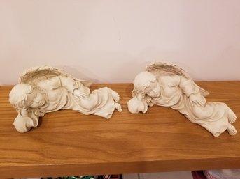 Pair Of Carved Resin Laying Down Angels