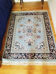 Small Blue Oriental Fringed Area Rug