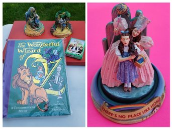 Trio Of Porcelain Figurines From The Franklin Mint Of Scenes From The Wizard Of Oz, A Book And Playing Cards