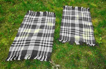 2 New Black And White Throw Rugs ......material??