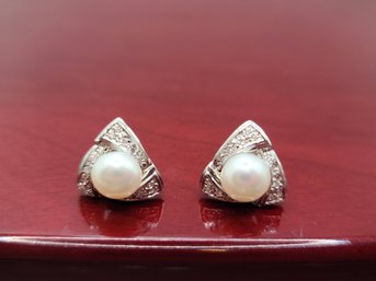 14KW 7.5/8 MM Pearl And .15 CT Pave Diamond Earrings